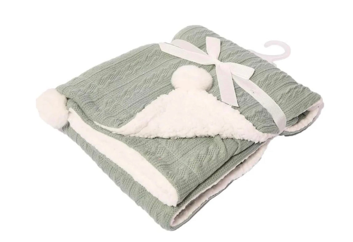 Personalised cable knit baby blanket with Pom Poms